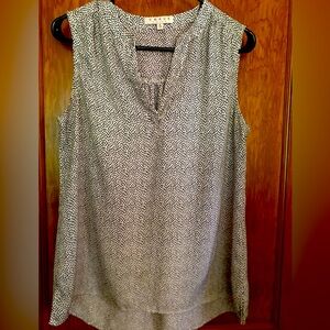 CHAUS black and white polkadot sleeveless V-neck blouse. Size S.